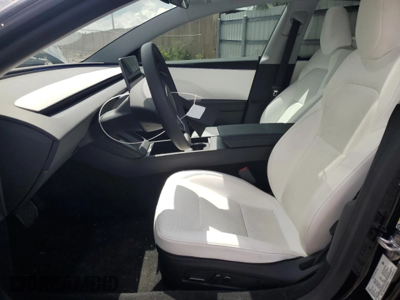 2025 Tesla Model 3 Long Range with VIN 5YJ3E1EA8SF984931, listed as a Copart auction lot 61259345 with 2,248 mi miles and Salvage title. Bid and sale history available at DreamBid. Image 7.