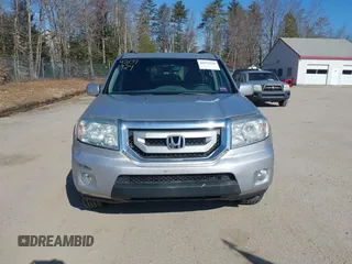 2011 Honda Pilot Touring with VIN 5FNYF4H96BB012122, listed as a IAAI auction lot 42071924 with 211,000 mi miles. Bid and sale history available at carsss.com. Image 12.