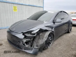 2022 Tesla Model Y Performance with VIN 7SAYGDEF1NF491967, listed as a Copart auction lot 51119515 with 50,520 mi miles and Salvage title. Bid and sale history available at DreamBid. Image 1.