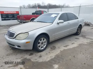 2002 Mercedes-Benz S-Class 5.0L with VIN WDBNG75J12A246997, listed as a IAAI auction lot 41566423 with 181,940 mi miles. Bid and sale history available at carsss.com. Image 17.