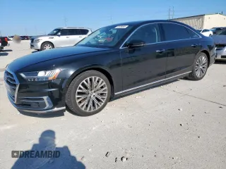 2019 Audi A8 with VIN WAU8DAF80KN011030, listed as a Copart auction lot 52036885 with 63,335 mi miles and Salvage title. Bid and sale history available at DreamBid. Image 1.