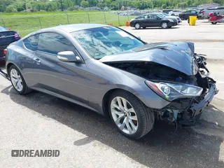 2015 Hyundai Genesis Coupe 3.8L Base z VIN KMHHT6KJ4FU130749, wystawiony jako IAAI lot #42190148 z przebiegiem 101 922 mil mil oraz . Historia ofert i sprzedaży dostępna na DreamBid. Obrazek 1.