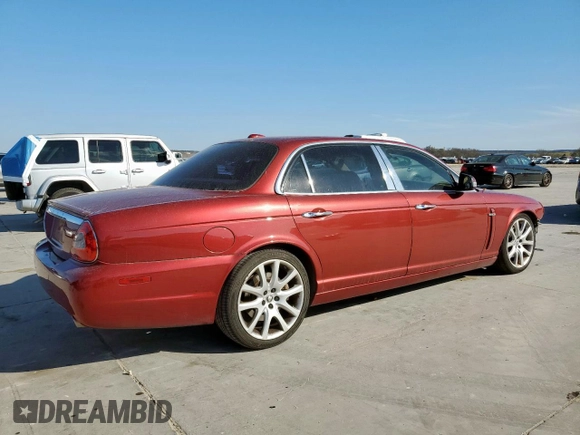 2008 Jaguar XJ with VIN SAJWA79B58SH20211, listed as a Copart auction lot 46951055 with 144,655 mi miles and Salvage Title. Bid and sale history available at carsss.com. Image 3.