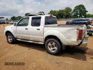 2001 Nissan Frontier SE z VIN 1N6ED27T21C305986, wystawiony jako Copart lot #59665065 z przebiegiem 201 540 mil mil oraz Czysty tytuł • Clean title. Historia ofert i sprzedaży dostępna na DreamBid. Obrazek 2.