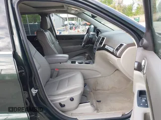 2011 Jeep Grand Cherokee 70th Anniversary with VIN 1J4RR4GG3BC631831, listed as a IAAI auction lot 42038415 with 130,811 mi miles. Bid and sale history available at carsss.com. Image 5.