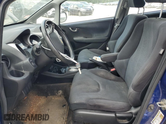 2009 Honda Fit Sport z VIN JHMGE88449S058618, wystawiony jako Copart lot #60717735 z przebiegiem 172 734 mil mil oraz Czysty tytuł • Clean title. Historia ofert i sprzedaży dostępna na DreamBid. Obrazek 7.