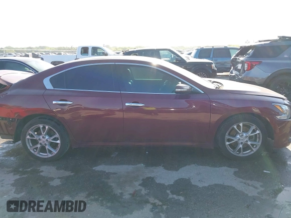 2013 Nissan Maxima S with VIN 1N4AA5AP5DC847780, listed as a IAAI auction lot 42018318 with 128,839 mi miles and . Bid and sale history available at DreamBid. Image 13.