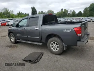 2007 Nissan Titan SE with VIN 1N6AA07B87N201924, listed as a Copart auction lot 60361425 with 167,659 mi miles and Salvage title. Bid and sale history available at DreamBid. Image 2.