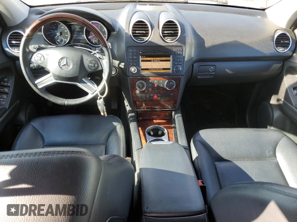2010 Mercedes-Benz M 550 with VIN 4JGBB7CB4AA533176, listed as a Copart auction lot 49954325 with 165,620 mi miles and Salvage Title. Bid and sale history available at DreamBid. Image 8.