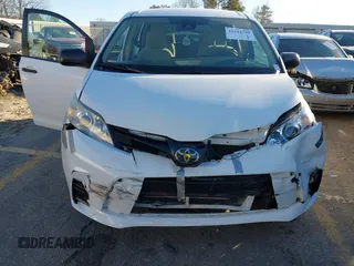2018 Toyota Sienna L with VIN 5TDZZ3DC4JS956096, listed as a IAAI auction lot 41244790 with 94,072 mi miles and . Bid and sale history available at DreamBid. Image 6.