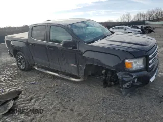 2015 GMC Canyon 4WD SLE with VIN 1GTG6BE34F1165547, listed as a Copart auction lot 43930715 with 124,970 mi miles and Salvage Title. Bid and sale history available at carsss.com. Image 4.