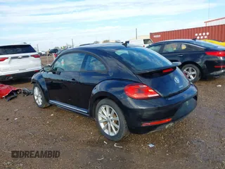 2018 Volkswagen Beetle S with VIN 3VWFD7ATXJM706338, listed as a IAAI auction lot 41293181 with 71,945 mi miles. Bid and sale history available at carsss.com. Image 15.