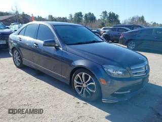 2011 Mercedes-Benz C with VIN WDDGF8BB3BR185319, listed as a IAAI auction lot 41973829 with Not Provided miles. Bid and sale history available at carsss.com. Image 1.