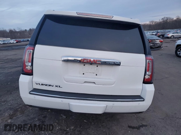 2020 GMC Yukon XL Denali with VIN 1GKS2HKJ1LR299560, listed as a Copart auction lot 84943284 with 99,084 mi miles and Salvage Title. Bid and sale history available at carsss.com. Image 6.