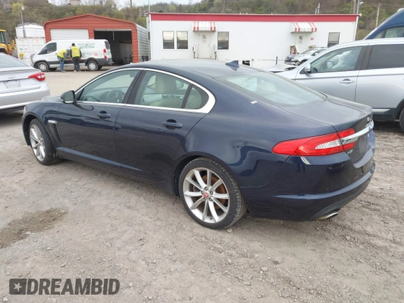 2015 Jaguar XF V6 Portfolio with VIN SAJWJ0FF5F8U67140, listed as a IAAI auction lot 41967522 with 68,000 mi miles. Bid and sale history available at carsss.com. Image 3.