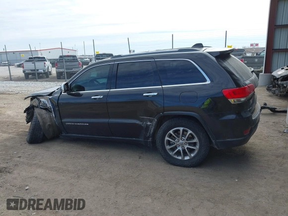 2015 Jeep Grand Cherokee Limited with VIN 1C4RJFBG1FC869568, listed as a IAAI auction lot 41665414 with 1 mi miles. Bid and sale history available at carsss.com. Image 14.