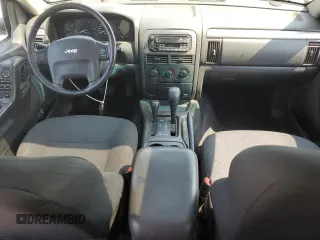 2002 Jeep Grand Cherokee Laredo with VIN 1J4GW48S92C319161, listed as a Copart auction lot 59304035 with 257,907 mi miles and Salvage title. Bid and sale history available at DreamBid. Image 8.