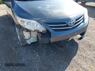 2013 Toyota Corolla L with VIN 2T1BU4EE9DC002558, listed as a IAAI auction lot 39670419 with 198,102 mi miles and . Bid and sale history available at DreamBid. Image 6.