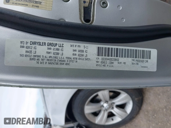 2011 Dodge Caliber Mainstreet with VIN 1B3CB3HA2BD238032, listed as a IAAI auction lot 41865918 with 98,022 mi miles and . Bid and sale history available at DreamBid. Image 9.