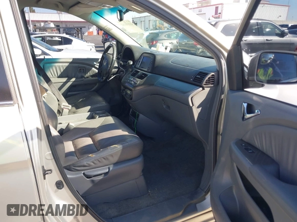 2005 Honda Odyssey TOURING with VIN 5FNRL38865B128519, listed as a IAAI auction lot 41830182 with 171,010 mi miles. Bid and sale history available at carsss.com. Image 5.