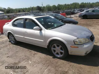 2000 Nissan Maxima GXE z VIN JN1CA31A5YT014461, wystawiony jako IAAI lot #42010202 z przebiegiem 296 180 mil mil oraz . Historia ofert i sprzedaży dostępna na DreamBid. Obrazek 1.