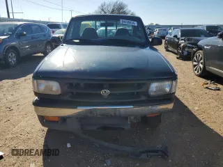 1997 Mazda B-Series 2WD Truck with VIN 4F4CR12A1VTM15033, listed as a Copart auction lot 84459434 with 143,764 mi miles and Salvage Title. Bid and sale history available at carsss.com. Image 5.