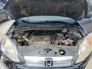 2009 Honda CR-V EX z VIN JHLRE38559C011942, wystawiony jako Copart lot #56342865 z przebiegiem 207 505 mil mil oraz Szkoda całkowita • Salvage title. Historia ofert i sprzedaży dostępna na DreamBid. Obrazek 12.
