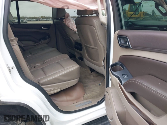 2015 Chevrolet Tahoe LT with VIN 1GNSCBKC4FR530776, listed as a IAAI auction lot 41754350 with 174,694 mi miles and . Bid and sale history available at DreamBid. Image 8.