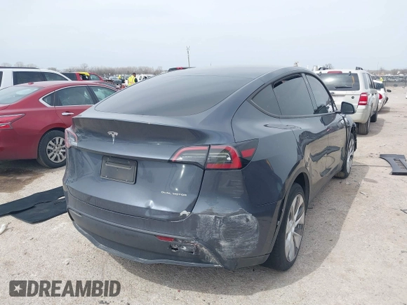2023 Tesla Model Y Long Range with VIN 7SAYGDEE0PA036048, listed as a IAAI auction lot 41775845 with 41,291 mi miles. Bid and sale history available at carsss.com. Image 4.