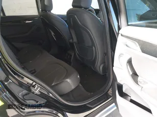 2018 BMW X1 xDrive28i z VIN WBXHT3C35J5L25056, wystawiony jako IAAI lot #42185474 z przebiegiem 62 631 mil mil oraz . Historia ofert i sprzedaży dostępna na DreamBid. Obrazek 8.