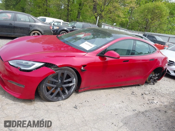 2022 Tesla Model S with VIN 5YJSA1E58NF470737, listed as a IAAI auction lot 42035040 with 15,224 mi miles and . Bid and sale history available at DreamBid. Image 14.