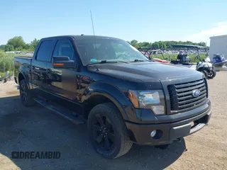 2012 Ford F-150 XL with VIN 1FTFW1ET4CFC54040, listed as a IAAI auction lot 42631980 with 165,009 mi miles and . Bid and sale history available at DreamBid. Image 1.