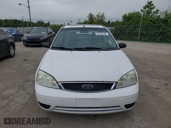 2007 Ford Focus S z VIN 1FAHP34N57W223198, wystawiony jako Copart lot #55725345 z przebiegiem 174 833 mil mil oraz Szkoda całkowita • Salvage title. Historia ofert i sprzedaży dostępna na DreamBid. Obrazek 5.