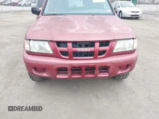 2004 Isuzu Rodeo S z VIN 4S2CK58W644317345, wystawiony jako IAAI lot #41940961 z przebiegiem Nie podano mil oraz . Historia ofert i sprzedaży dostępna na DreamBid. Obrazek 6.