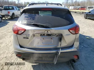2015 Mazda CX-5 Grand Touring with VIN JM3KE4DY5F0460465, listed as a Copart auction lot 46392605 with 103,185 mi miles and Salvage Title. Bid and sale history available at carsss.com. Image 6.