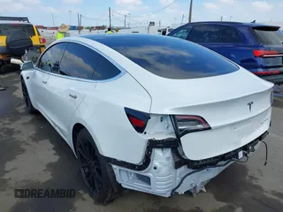 2020 Tesla Model 3 Long Range with VIN 5YJ3E1EB9LF795246, listed as a IAAI auction lot 41895750 with 163,061 mi miles and . Bid and sale history available at DreamBid. Image 3.