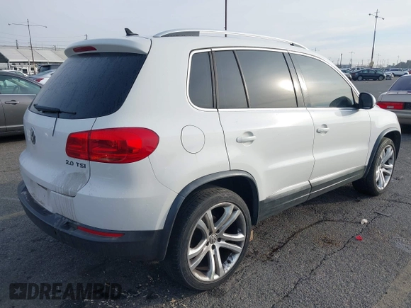 2012 Volkswagen Tiguan SE z VIN WVGAV7AX6CW535969, wystawiony jako IAAI lot #41464523 z przebiegiem 138 858 mil mil oraz . Historia ofert i sprzedaży dostępna na DreamBid. Obrazek 4.