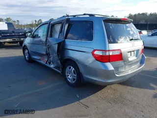 2007 Honda Odyssey EX-L with VIN 5FNRL38627B132925, listed as a IAAI auction lot 41793141 with 168,000 mi miles. Bid and sale history available at carsss.com. Image 3.