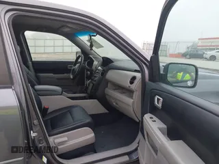2014 Honda Pilot LX with VIN 5FNYF4H2XEB004614, listed as a IAAI auction lot 42236980 with 160,357 mi miles and . Bid and sale history available at DreamBid. Image 5.