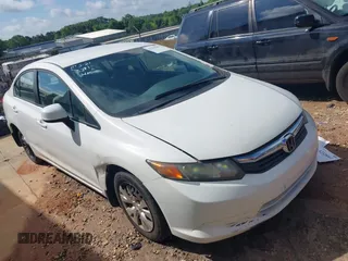2012 Honda Civic LX z VIN 19XFB2F5XCE070605, wystawiony jako IAAI lot #42305381 z przebiegiem 181 984 mil mil oraz . Historia ofert i sprzedaży dostępna na DreamBid. Obrazek 1.