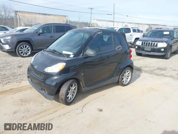 2009 Smart fortwo Passion z VIN WMEEK31X29K288815, wystawiony jako IAAI lot #40953956 z przebiegiem Nie podano mil oraz . Historia ofert i sprzedaży dostępna na DreamBid. Obrazek 2.