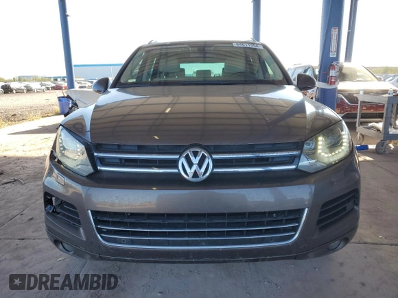 2012 Volkswagen Touareg Exec with VIN WVGEF9BP8CD008665, listed as a Copart auction lot 84611354 with 103,090 mi miles and Salvage Title. Bid and sale history available at DreamBid. Image 5.