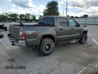 2011 Toyota Tacoma with VIN 3TMLU4EN6BM070132, listed as a Copart auction lot 56536564 with 185,256 mi miles and Salvage Title. Bid and sale history available at DreamBid. Image 3.