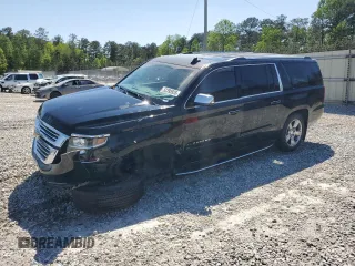 2018 Chevrolet Suburban Premier with VIN 1GNSCJKC1JR199271, listed as a Copart auction lot 52395935 with 216,083 mi miles and Salvage Title. Bid and sale history available at DreamBid. Image 1.