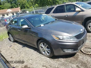 2013 Kia Optima EX с VIN 5XXGN4A72DG180637, выставлен на аукционе Copart как лот 66261835 с пробегом Не указан миль и Списание • Salvage title. История ставок и продаж доступна на DreamBid. Изображение 4.