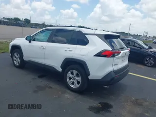2021 Toyota RAV4 XLE with VIN 2T3W1RFV1MC136218, listed as a IAAI auction lot 42507539 with 32,351 mi miles and . Bid and sale history available at DreamBid. Image 3.