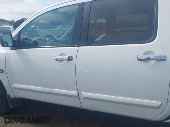 2004 Nissan Titan LE with VIN 1N6AA07B74N581334, listed as a IAAI auction lot 42265633 with 189,892 mi miles and . Bid and sale history available at DreamBid. Image 14.