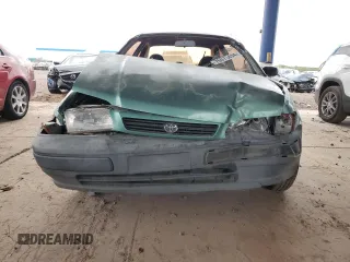 1995 Toyota Tercel z VIN JT2EL55D7S0001213, wystawiony jako Copart lot #76075434 z przebiegiem 272 084 mil mil oraz Szkoda całkowita • Salvage title. Historia ofert i sprzedaży dostępna na DreamBid. Obrazek 5.