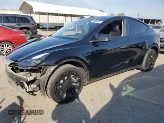 2023 Tesla Model Y Long Range with VIN 7SAYGDEE5PF834645, listed as a Copart auction lot 48596925 with 26,896 mi miles and Salvage Title. Bid and sale history available at DreamBid. Image 1.