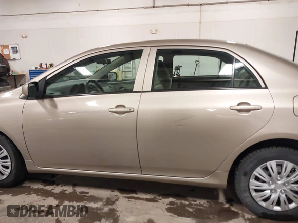 2010 Toyota Corolla with VIN 2T1BU4EE2AC369927, listed as a IAAI auction lot 41519760 with 135,639 mi miles. Bid and sale history available at carsss.com. Image 14.